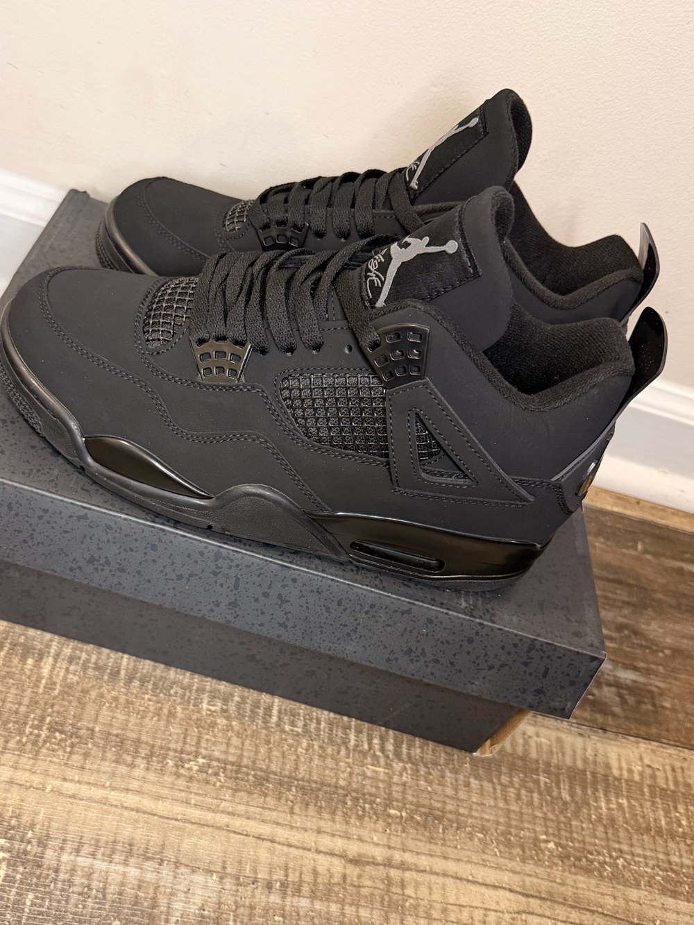 Jordan Retro 4 All-Black Low-Top Sneakers